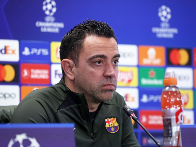 Xavi e OUT de la Barcelona